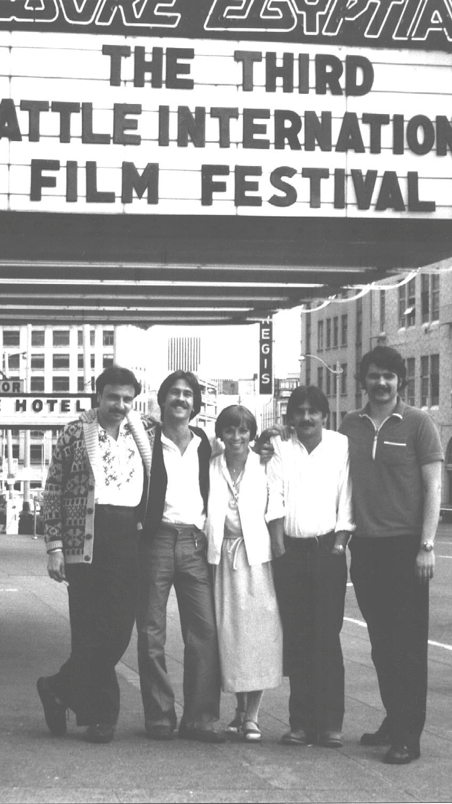 SIFFers, including festival founders, Darryl Macdonald (second from right) and Dan Ireland (second from left), under the Moore Egyptian marquee for the 3rd Seattle International Film Festival