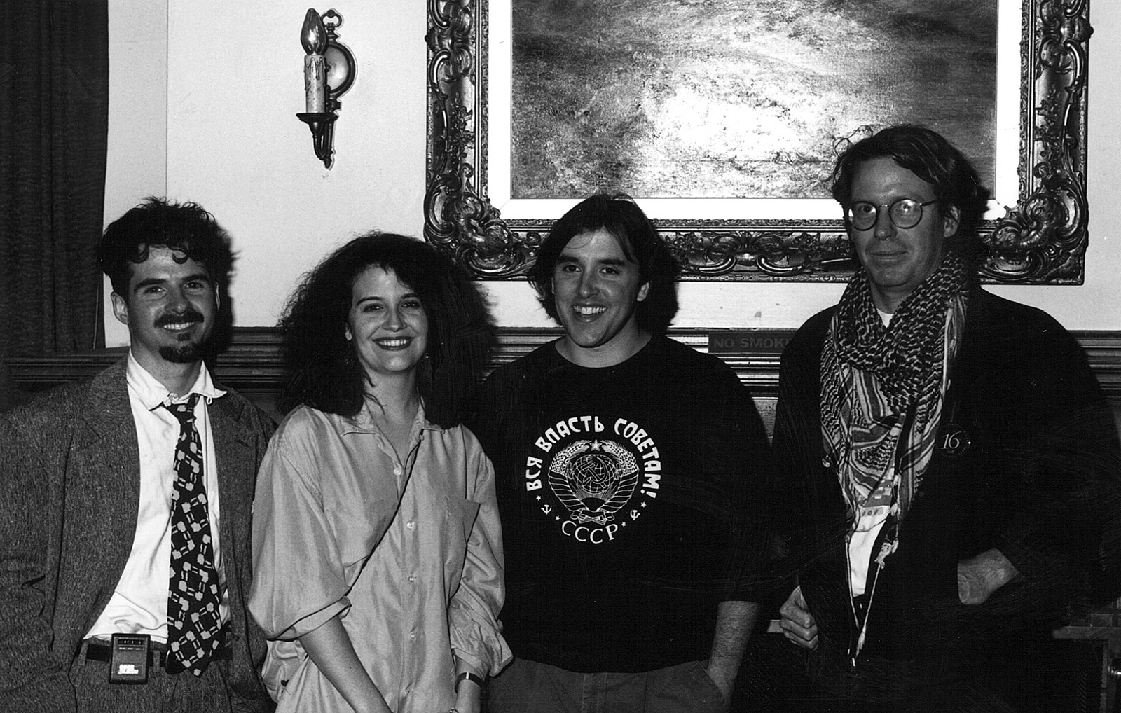 Director, Richard Linklater (second from right), poses with others from his film, Slacker, in the Harvard Exit lobby