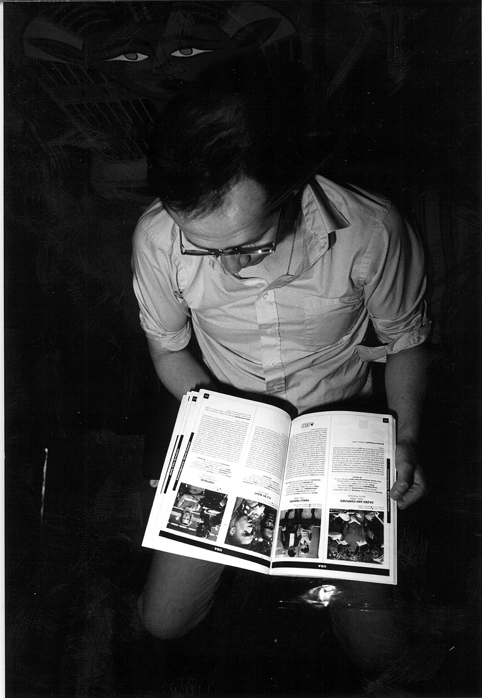 SIFFer planning his film schedule, currently open to page 76-77 in the program, a spread that included the World Premiere of Dazed and Confused