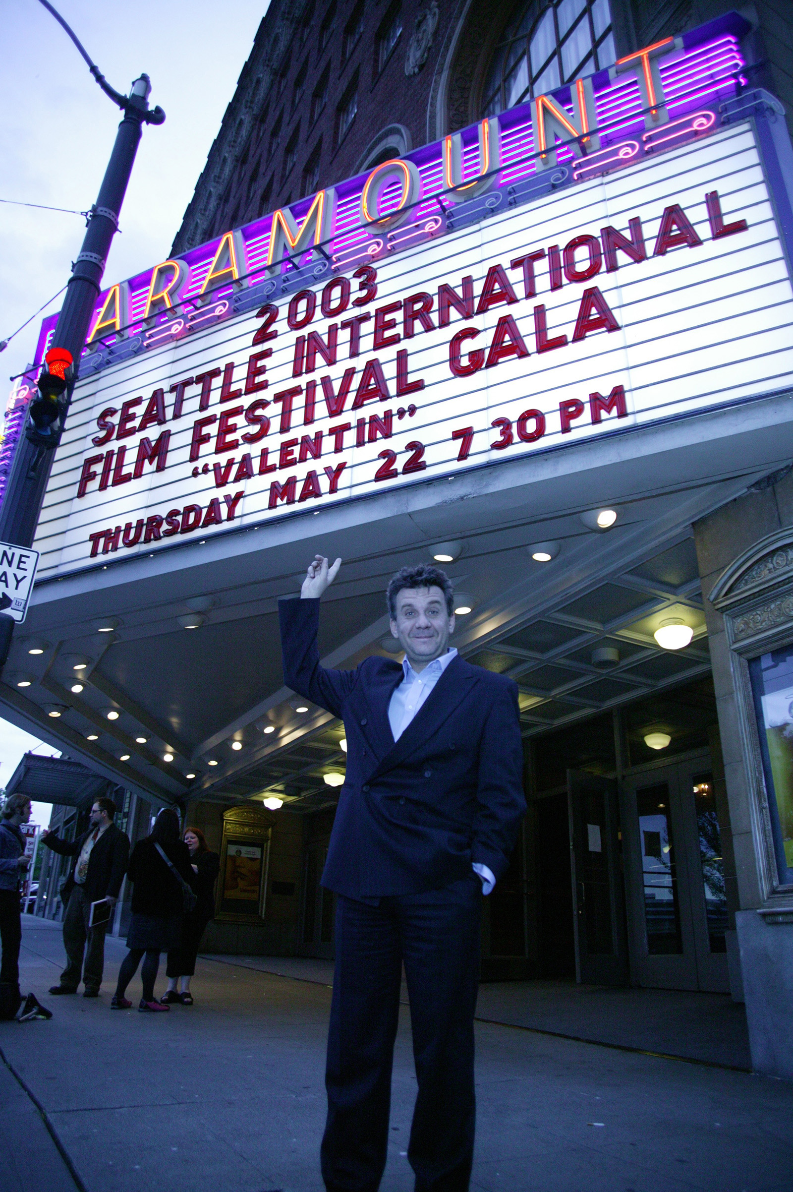 Director, Alejandro Agresti, poses under the Paramount marquee to celebrate the opening night of the 28th Seattle International Film Festival with his film, Valentin