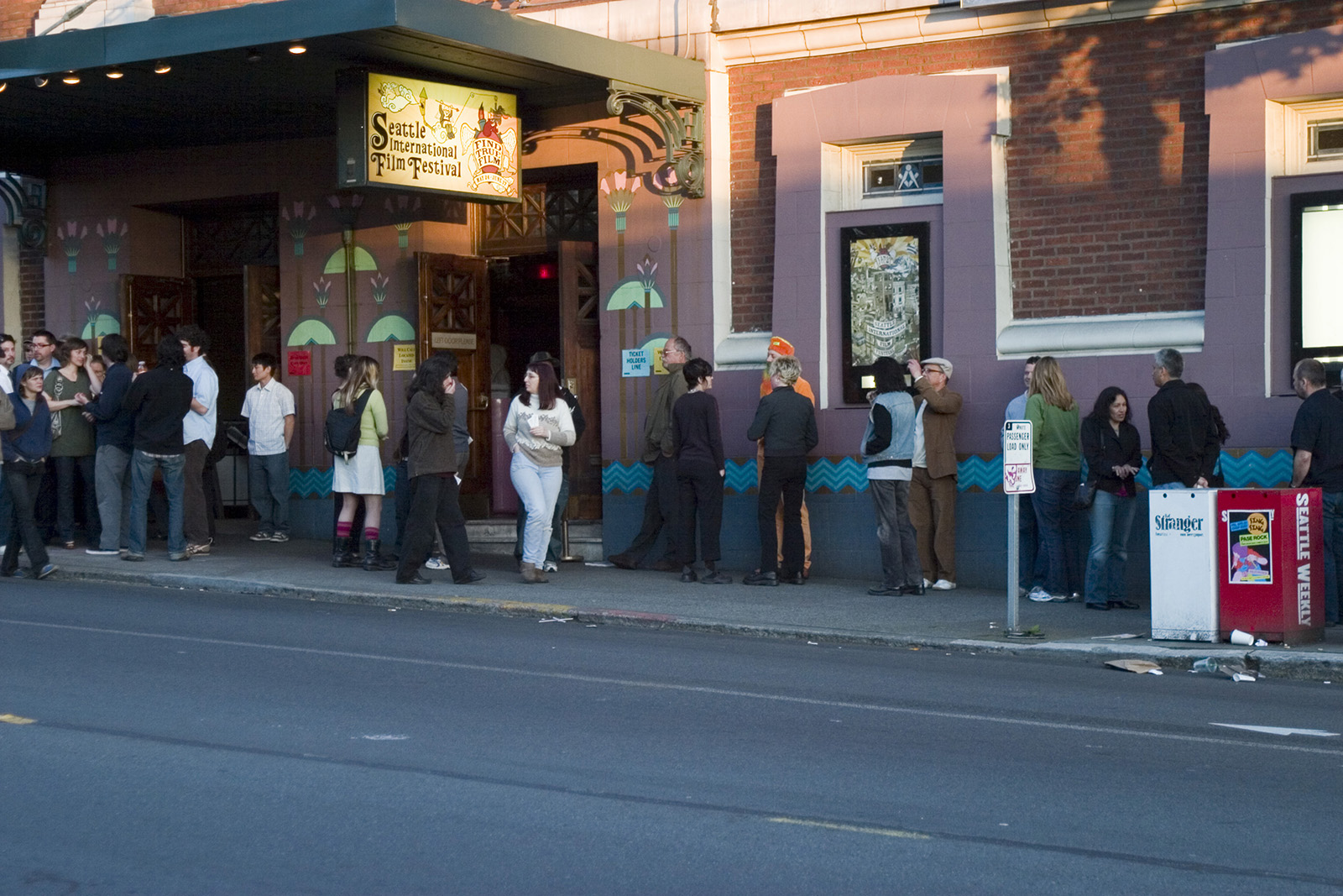 Attendees of the 33rd Seattle International Film Festival line up outside the Egyptian Theatre
