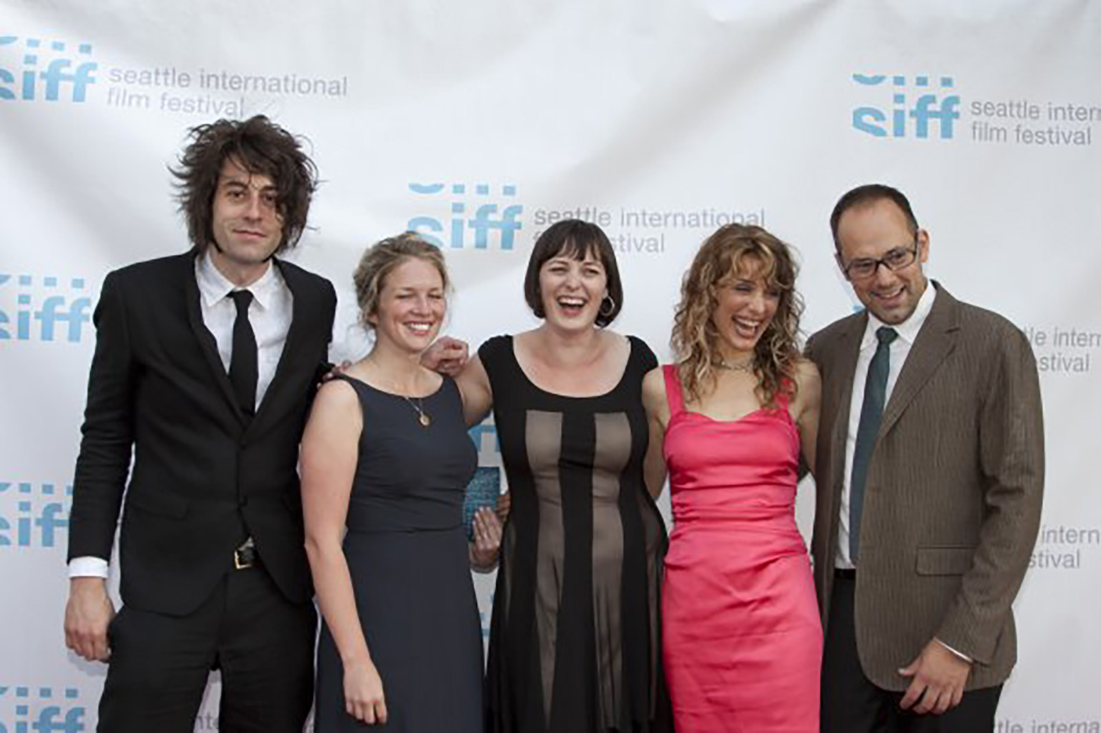 Guests from the film, Humpday, including director, Lynn Shelton, and acress, Alycia Delmore, gather on the red carpet with SIFF's Artistic Director, Carl Spence, for the Centerpiece Film & Gala