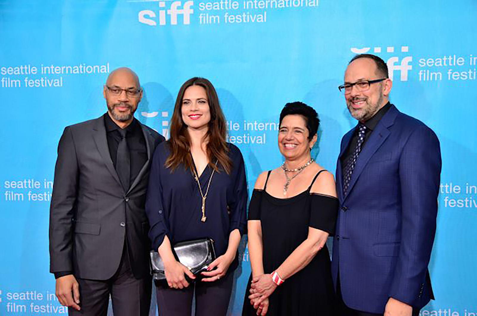 Musician and actor, André 3000, and actress, Hayley Atwell, celebrate their film, Jimi: All Is by My Side, with SIFF's Mary Bacarella and Carl Spence on the red carpet on Opening Night