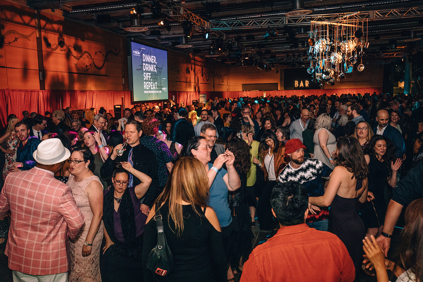 The party crowd inside Fisher Pavilion during the SIFF 2019 Opening Party