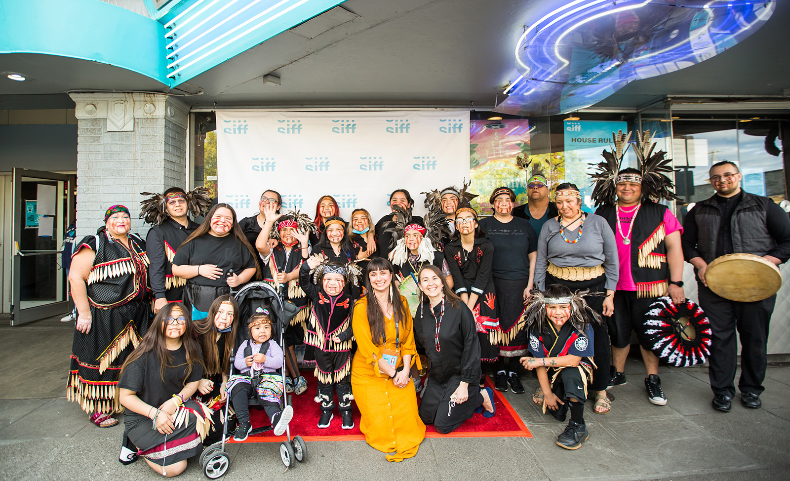 Director, Brooke Pepion Swaney, subjects, Kendra Mylnechuk and Lhaq'temish, the Lummi People, pose on the red carpet before the screening of their film, Daughter of a Lost Bird